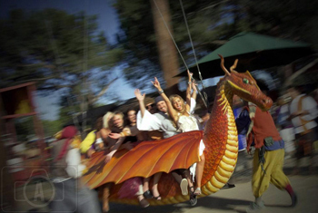 bride and groom riding the dragon
